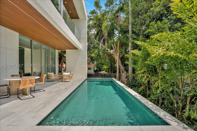 5 bedroom SingleFamilyResidence at 7701 Coquina Drive, North Bay Island, North Bay Village — photo 2