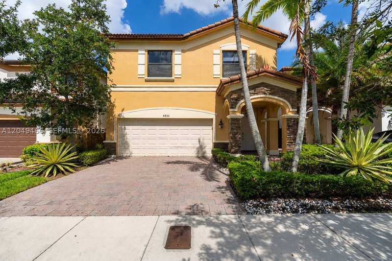 5 bedroom SingleFamilyResidence at 8850 NW 99th Path, Isles At Grand Bay, Doral — photo 1