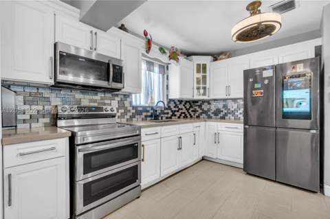295 NW 122nd St, North Miami FL - photo 9 of 28