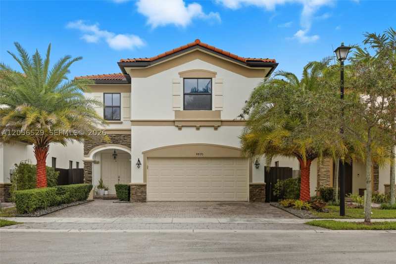 4 bedroom SingleFamilyResidence at 8870 NW 99th Path, Isles At Grand Bay, Doral — photo 1