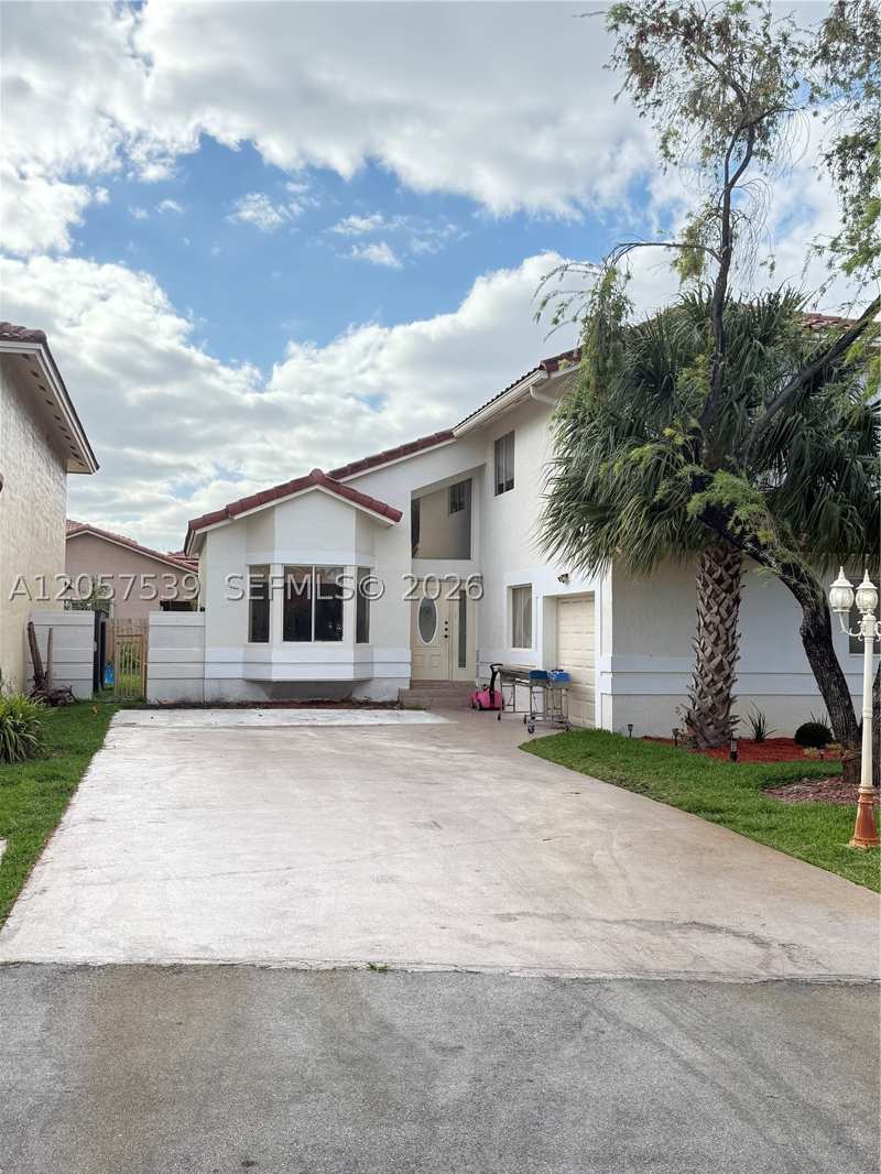 4 bedroom SingleFamilyResidence at 18318 NW 61st Ct, Harbour Sub, Hialeah — photo 1
