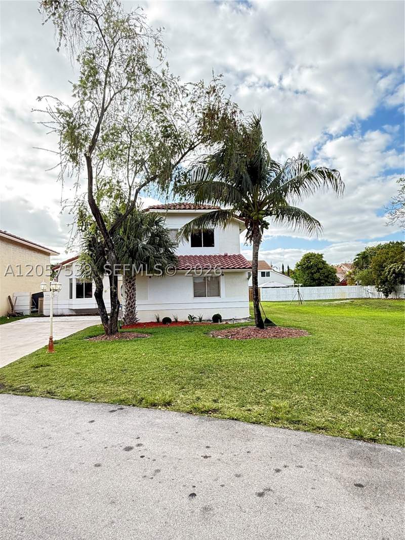 4 bedroom SingleFamilyResidence at 18318 NW 61st Ct, Harbour Sub, Hialeah — photo 2