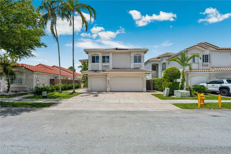 5 bedroom SingleFamilyResidence at 10865 NW 73rd Ter, Doral Isles St Croix, Doral — photo 1