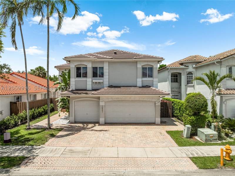 5 bedroom SingleFamilyResidence at 10865 NW 73rd Ter, Doral Isles St Croix, Doral — photo 2