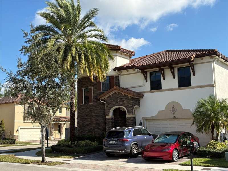 5 bedroom SingleFamilyResidence at 8925 NW 99th Ct, Doral Breeze, Doral — photo 1