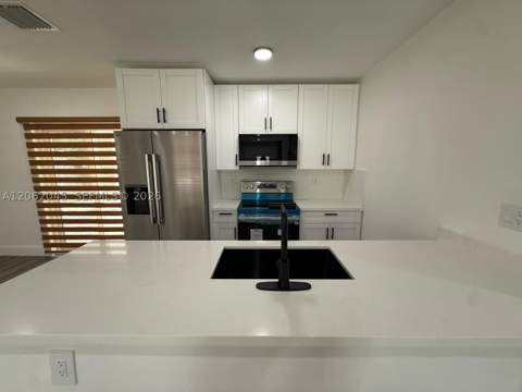 1251 NE 208th Ter, Miami FL - photo 10 of 35
