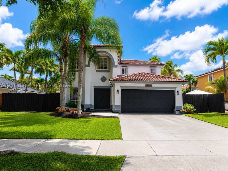 4 bedroom SingleFamilyResidence at 9002 SW 212th Ter, Lakes By The Bay Sec 10, Cutler Bay — photo 1
