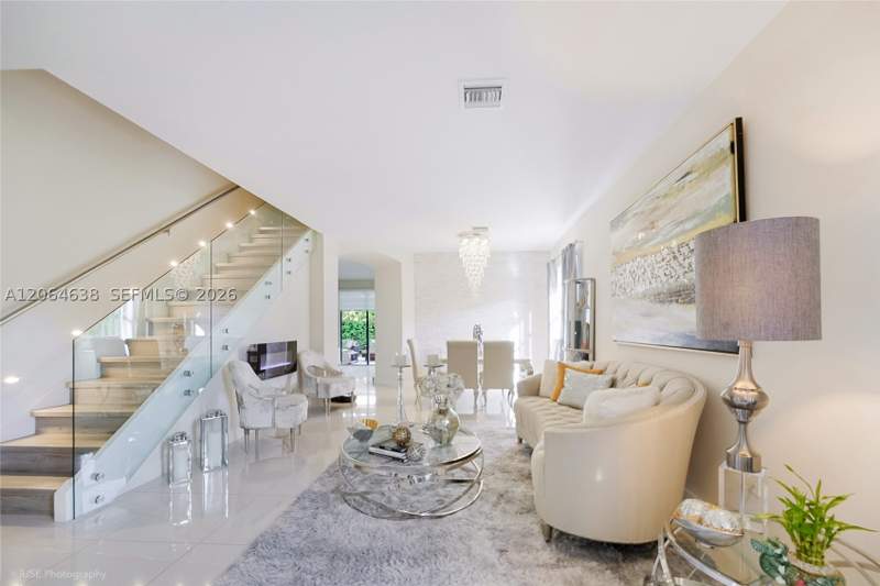 4 bedroom SingleFamilyResidence at 8723 NW 102nd Pl, Grand Bay North, Doral — photo 3