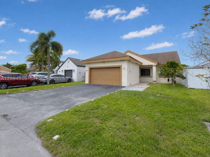 3 bedroom SingleFamilyResidence at 18772 NW 80th Ct, Lakes Of Avalon Sec 3, Hialeah — photo 2