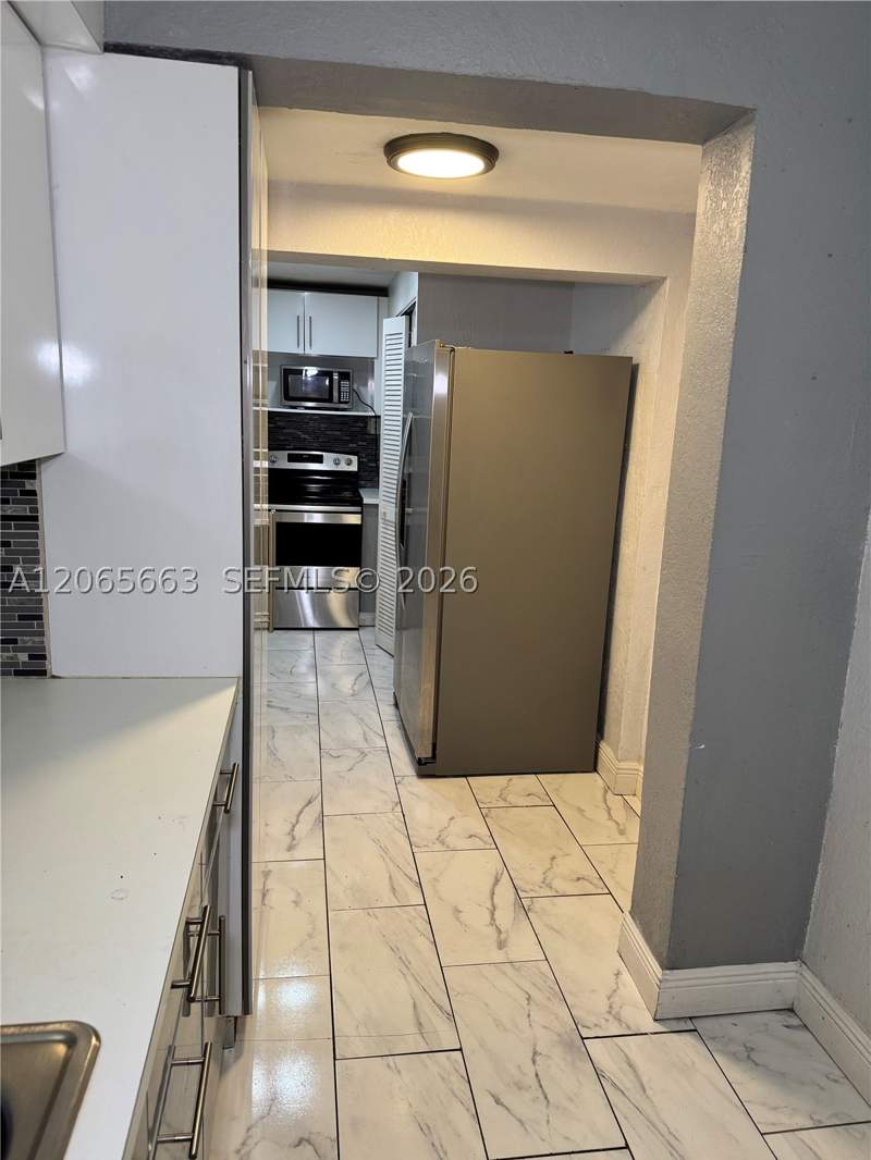 3 bedroom SingleFamilyResidence at 350 NW 58th Ave, W Flagler Pk, Miami — photo 3