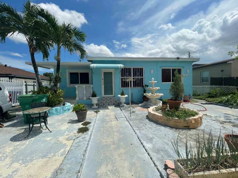 4 bedroom SingleFamilyResidence at 3180 NW 49th Street, Home Owners Paradise, Miami — photo 1