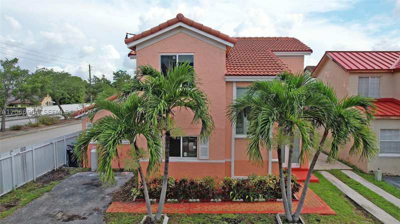 4 bedroom SingleFamilyResidence at 12693 NW 8th Ter, Lake Pointe Sec 4, Miami — photo 1