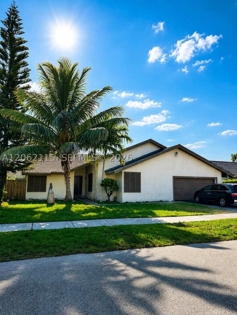4 bedroom SingleFamilyResidence at 9712 SW 133rd Pl, Calusa Club Estates 5th A, Miami — photo 1