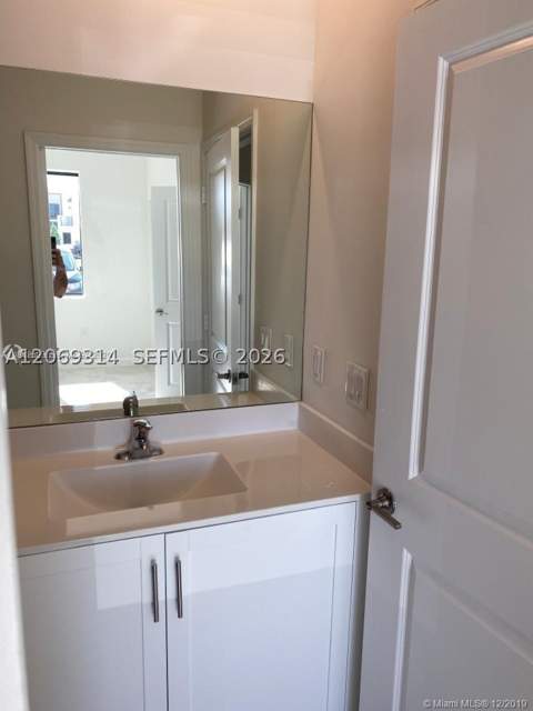 388 NE 208th Ter, Miami FL - photo 11 of 34