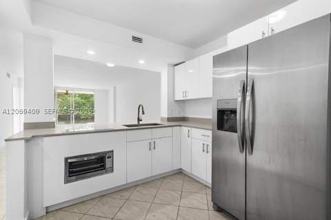 3660 NE 166th St 114, North Miami Beach FL - photo 7 of 28