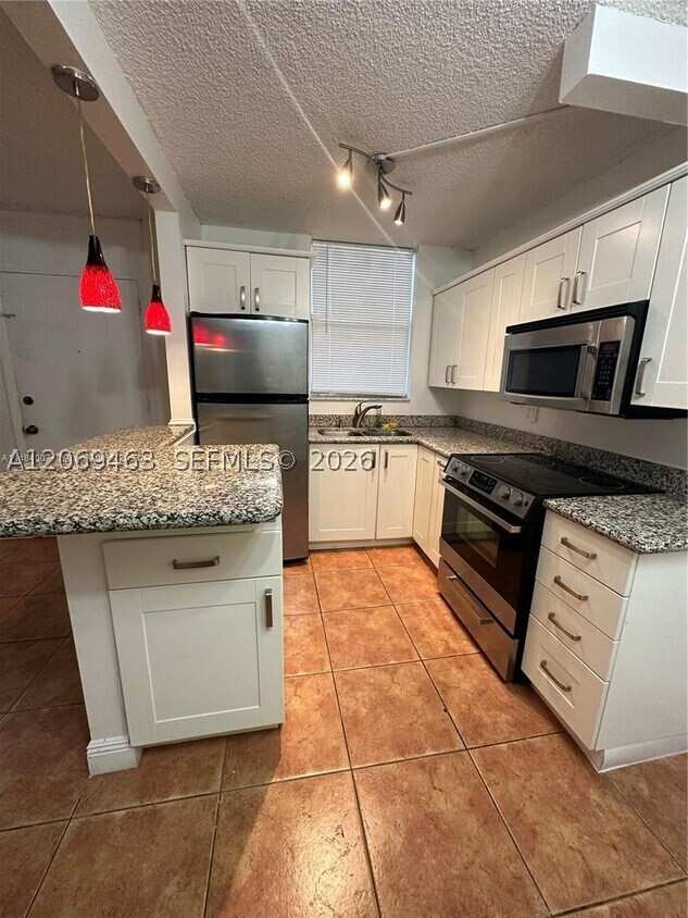 1 bedroom Condominium at 1801 S Treasure Dr 112, North Bay Villas Condo, North Bay Village — photo 1