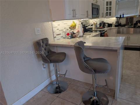 560 NW 184th Ter, Miami Gardens FL - photo 11 of 38