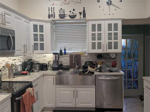 560 NW 184th Ter, Miami Gardens FL - photo 9 of 38
