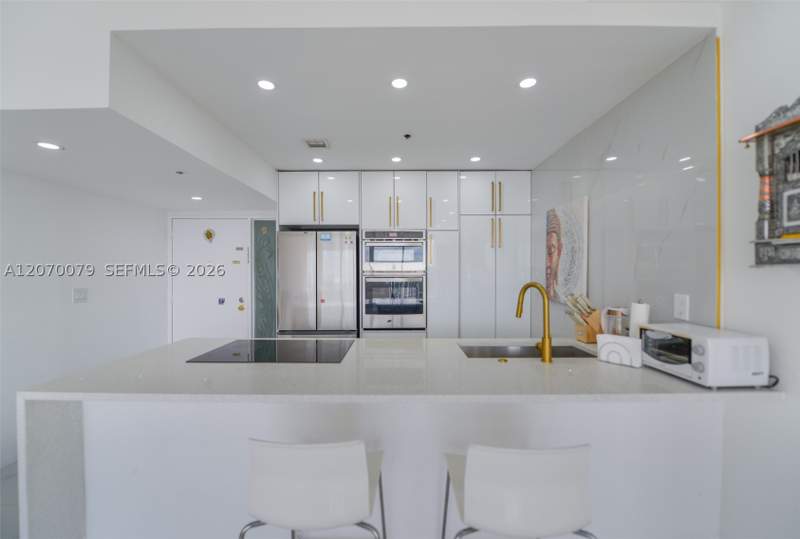 2 bedroom Condominium at 7601 E Treasure Dr Ph103, The Grandview Palace Cond, North Bay Village — photo 4