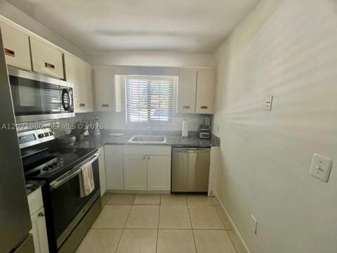 1133 NE 210th Ter, Miami FL - photo 6 of 34