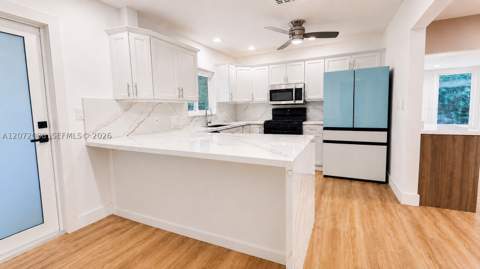 8819 Dickens Ave, Surfside FL - photo 13 of 36