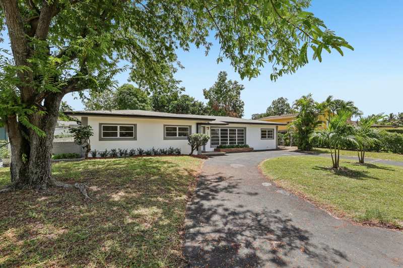 4 bedroom SingleFamilyResidence at 1040 NW 149th Street, Biscayne Lake View, Miami — photo 1