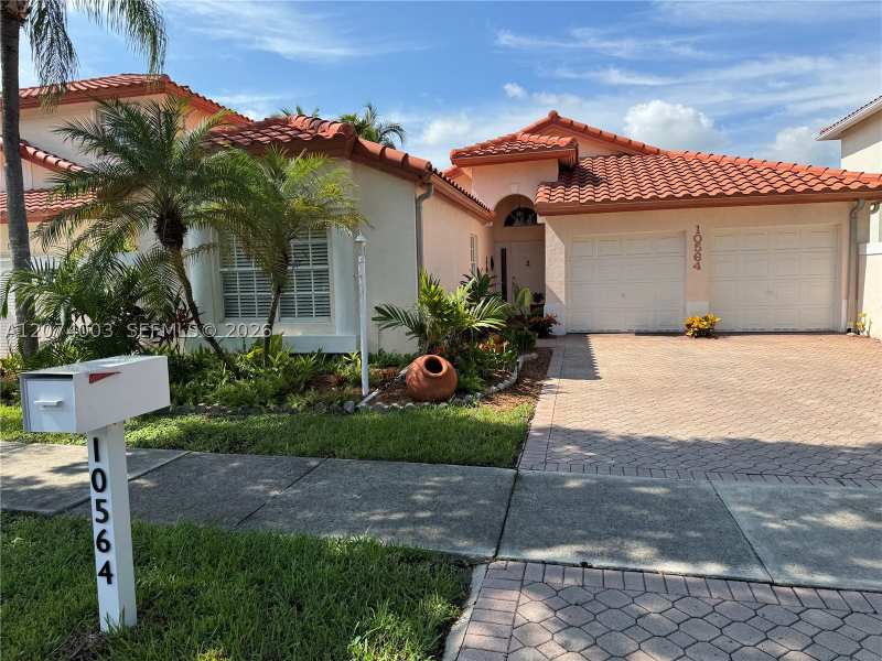 4 bedroom SingleFamilyResidence at 10564 NW 57th St, Doral Sands, Doral — photo 1
