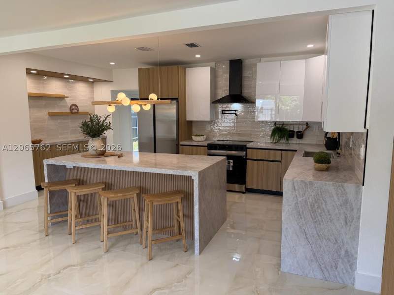4 bedroom SingleFamilyResidence at 1055 NW 143rd St, BISCAYNE GARDENS SEC F PA, Miami — photo 4