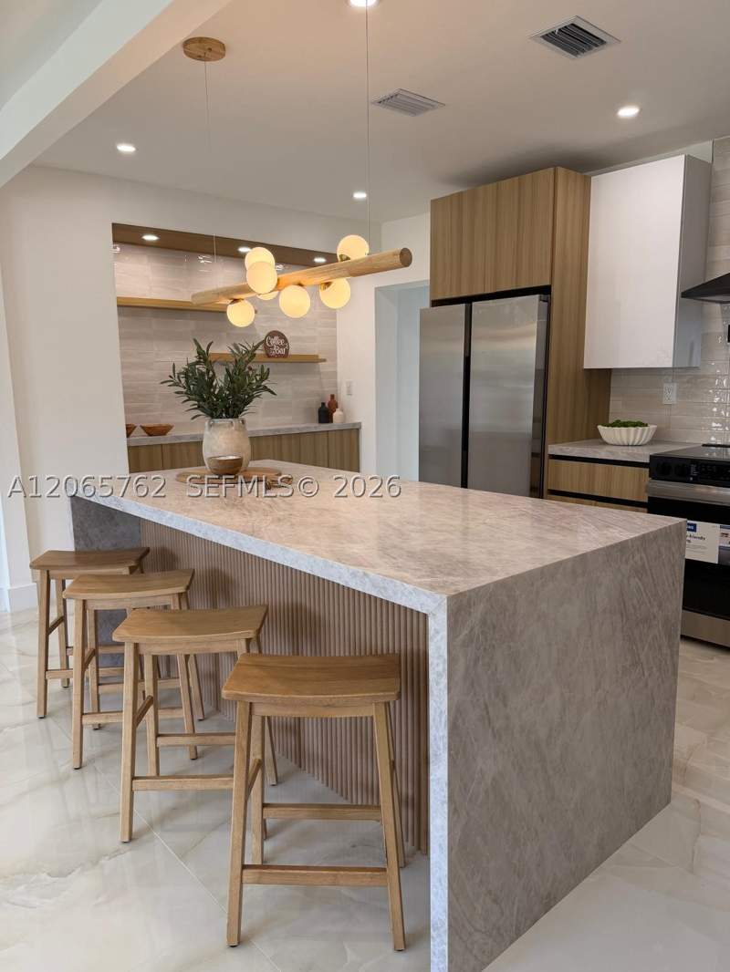 4 bedroom SingleFamilyResidence at 1055 NW 143rd St, BISCAYNE GARDENS SEC F PA, Miami — photo 5