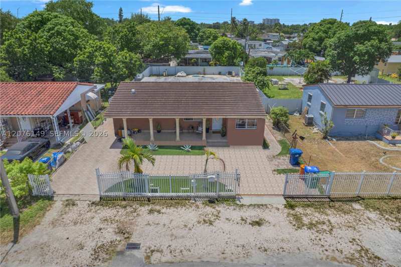 5 bedroom SingleFamilyResidence at 3030 NW 90th St, The Tropics Amd, Miami — photo 1