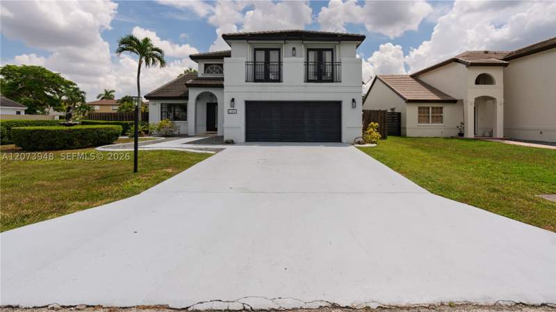 4 bedroom SingleFamilyResidence at 7301 SW 159th Ave, HEFTLER HOMES AT LAGO MAR, Miami — photo 2