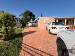4 bedroom SingleFamilyResidence at 17201 NW 54th Ct, Carol City Red Road Manor, Miami Gardens — photo 2