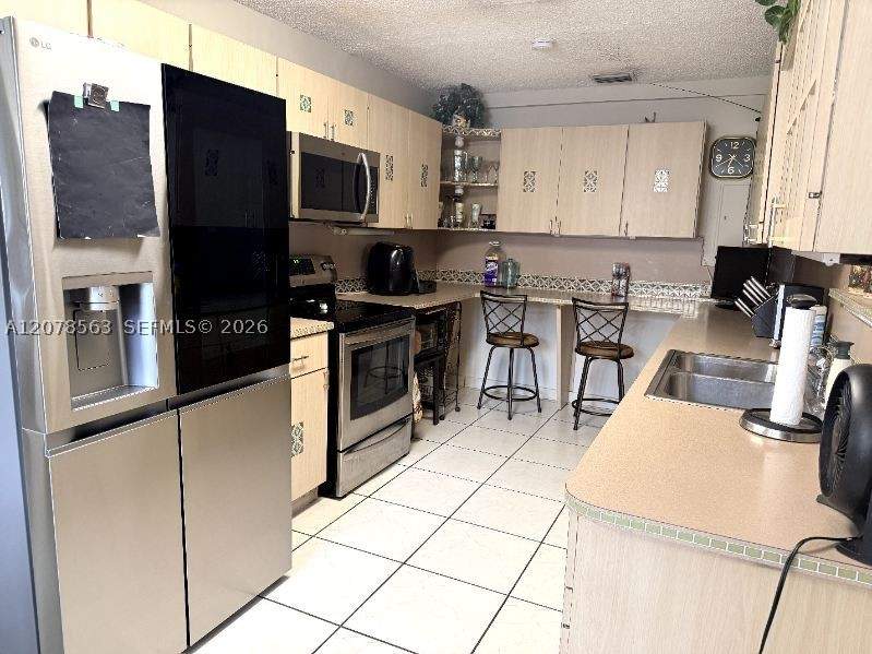 4 bedroom SingleFamilyResidence at 1340 W 36th St, Castle Estates, Hialeah — photo 5