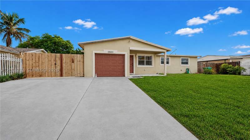 4 bedroom SingleFamilyResidence at 26201 SW 125th Ave, Meadow Woodmanor Sec 2, Homestead — photo 3