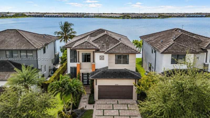 4 bedroom SingleFamilyResidence at 15742 NW 88th Ave, Dunnwoody Lake, Miami Lakes — photo 1