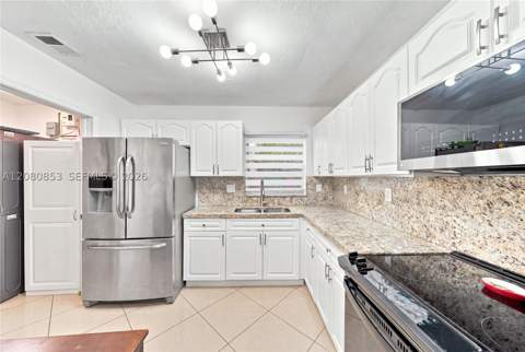 4111 NW 203rd Ln, Miami Gardens FL - photo 9 of 35