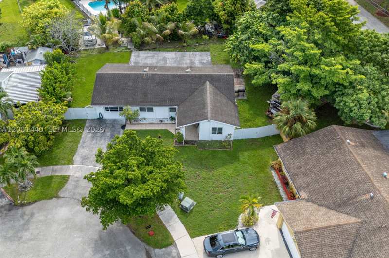 4 bedroom SingleFamilyResidence at 7159 SW 148th Pl, Westwind Lakes Sec 1, Miami — photo 1