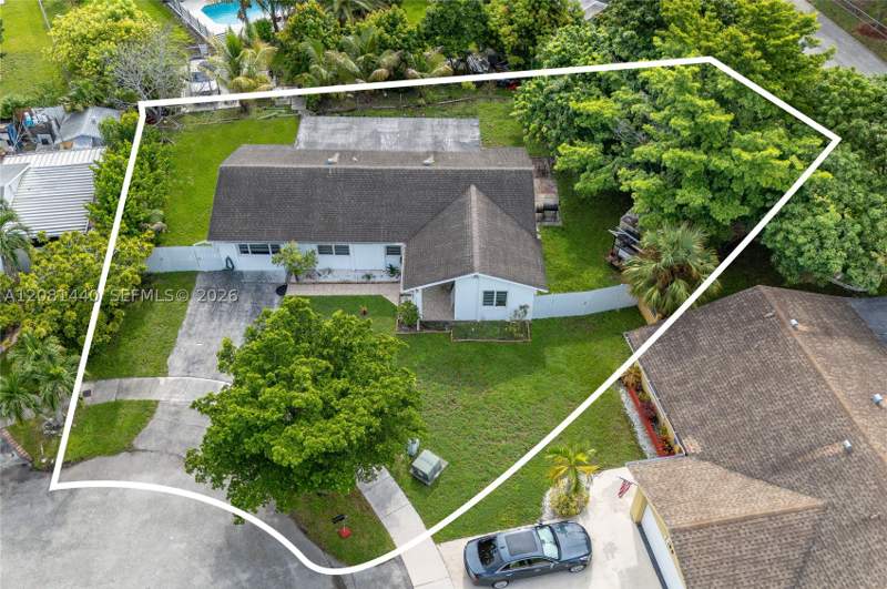 4 bedroom SingleFamilyResidence at 7159 SW 148th Pl, Westwind Lakes Sec 1, Miami — photo 2