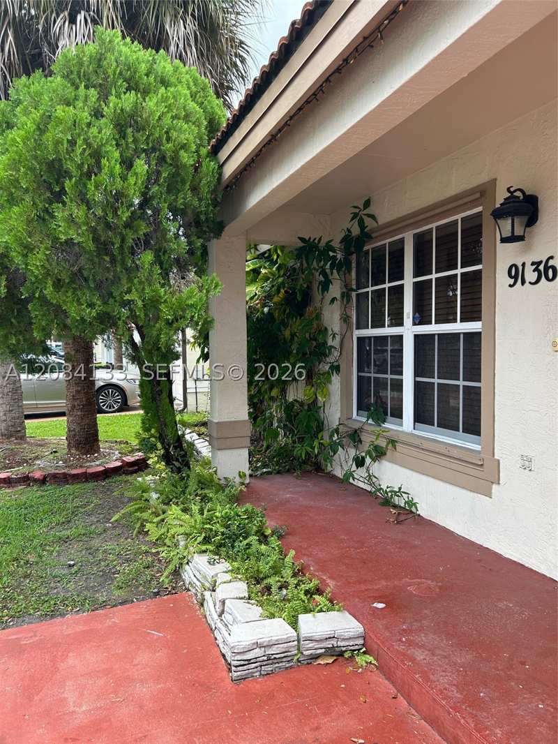 2 bedroom SingleFamilyResidence at 9136 NW 192nd Ter, Lakes On The Green North, Hialeah — photo 1