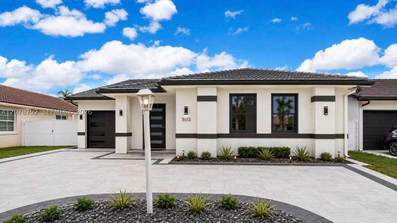 4 bedroom SingleFamilyResidence at 9053 NW 146th Ter, Florida Tropical Estates, Miami Lakes — photo 1