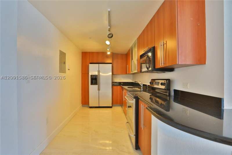2 bedroom Condominium at 7501 E Treasure Dr 4K, Treasures On The Bay II C, North Bay Village — photo 1