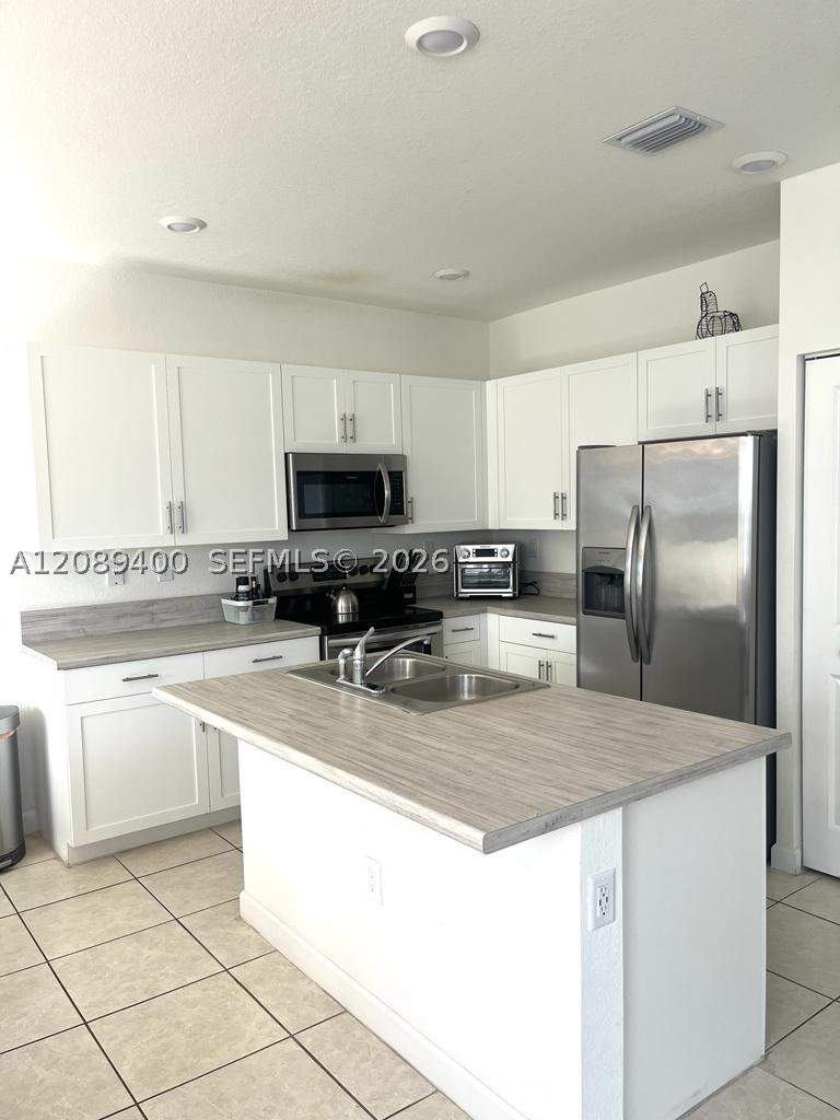 4 bedroom Townhouse at 560 NE 206th Ln, Via Ventura Neighborhood, Miami — photo 4