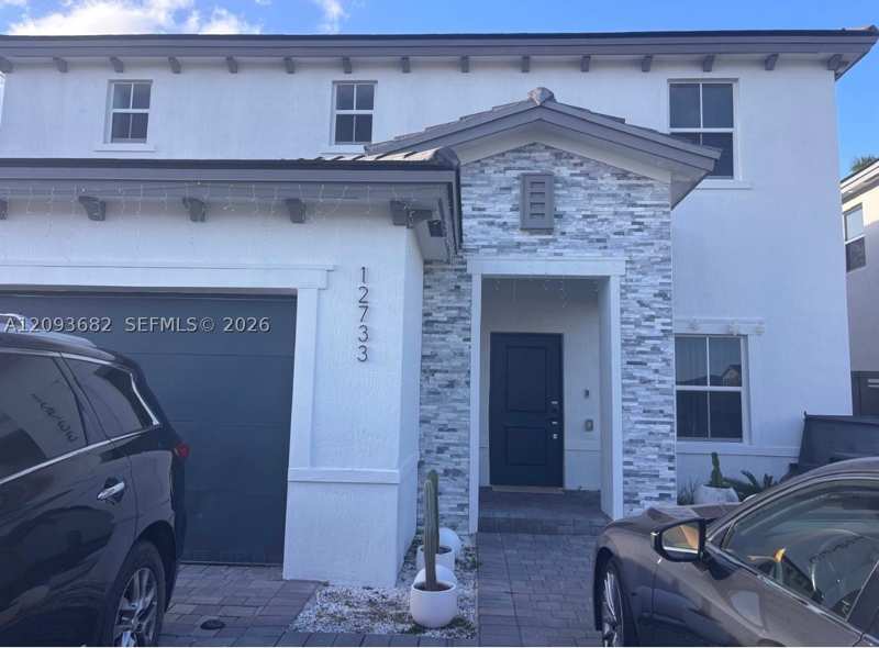 4 bedroom SingleFamilyResidence at 12733 SW 210th Ter, Siena North, Miami — photo 1