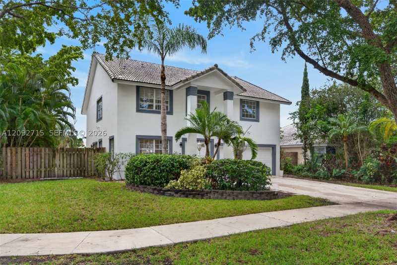 5 bedroom SingleFamilyResidence at 9410 SW 212th Ter, Lakes By The Bay Sec 7, Cutler Bay — photo 1