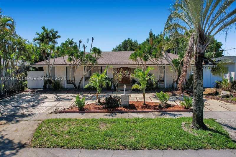 5 bedroom SingleFamilyResidence at 2310 NE 195th St, Enchanted Lake Sec 6, Miami — photo 1