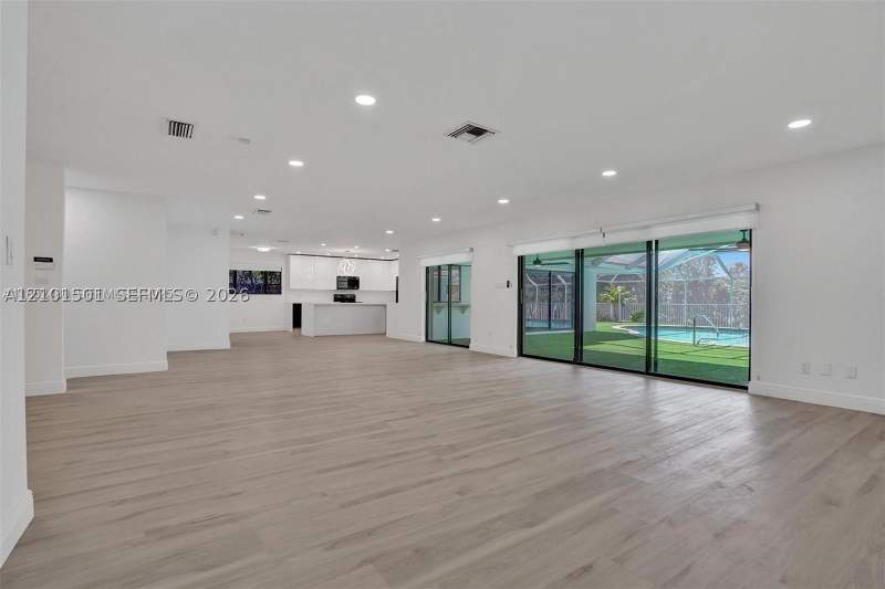 5 bedroom SingleFamilyResidence at 2310 NE 195th St, Enchanted Lake Sec 6, Miami — photo 3