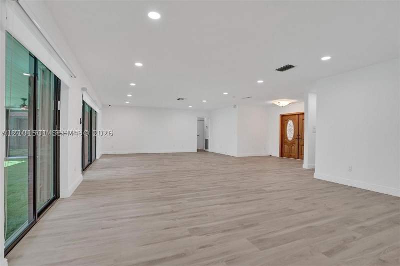 5 bedroom SingleFamilyResidence at 2310 NE 195th St, Enchanted Lake Sec 6, Miami — photo 4