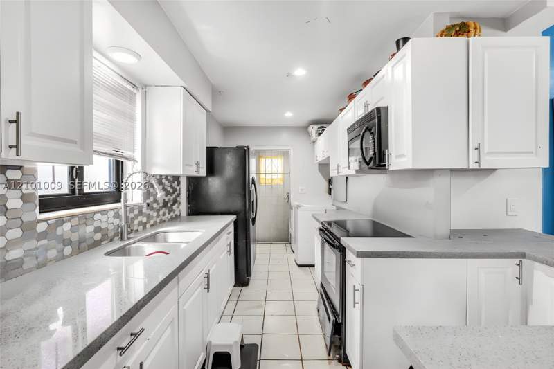 3 bedroom SingleFamilyResidence at 1220 NW 91st St, Cravero Lake Shore Estate, Miami — photo 5