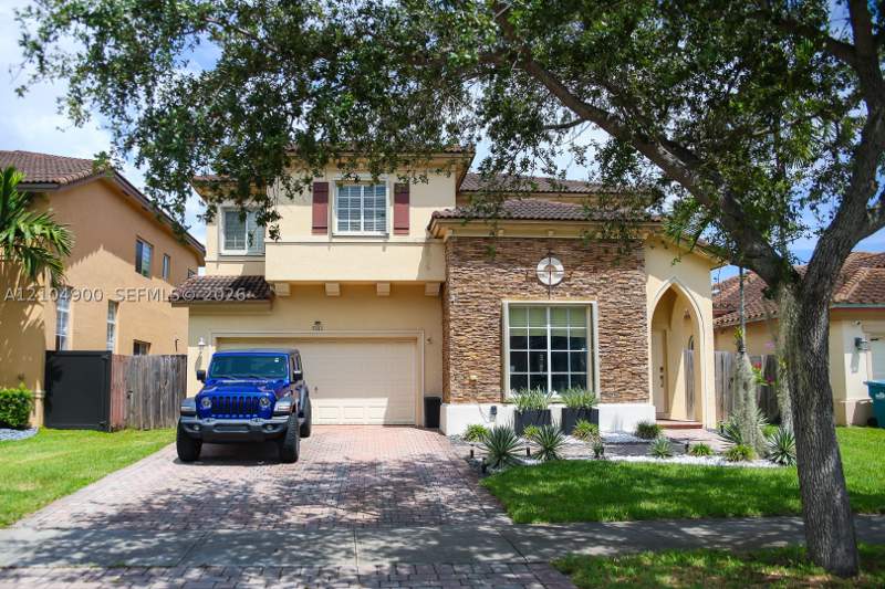 4 bedroom SingleFamilyResidence at 9383 SW 227th Ln, Lakes By The Bay Day, Cutler Bay — photo 2