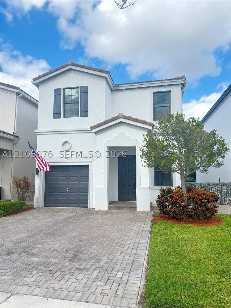 4 bedroom SingleFamilyResidence at 717 NE 191st St, Champion Lakes, Miami — photo 1